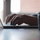 hands and a computer keyboard